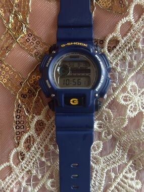 Casio G-Shock Blue Digital Sports Watch with Yellow Accents